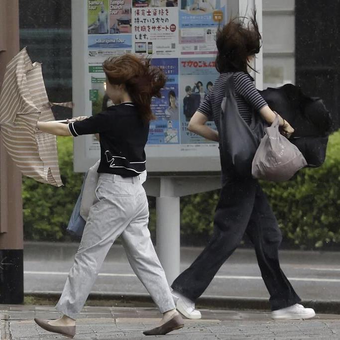 Khanun begins blowing into South Korea with strong winds after dumping rain on Japan for a week
